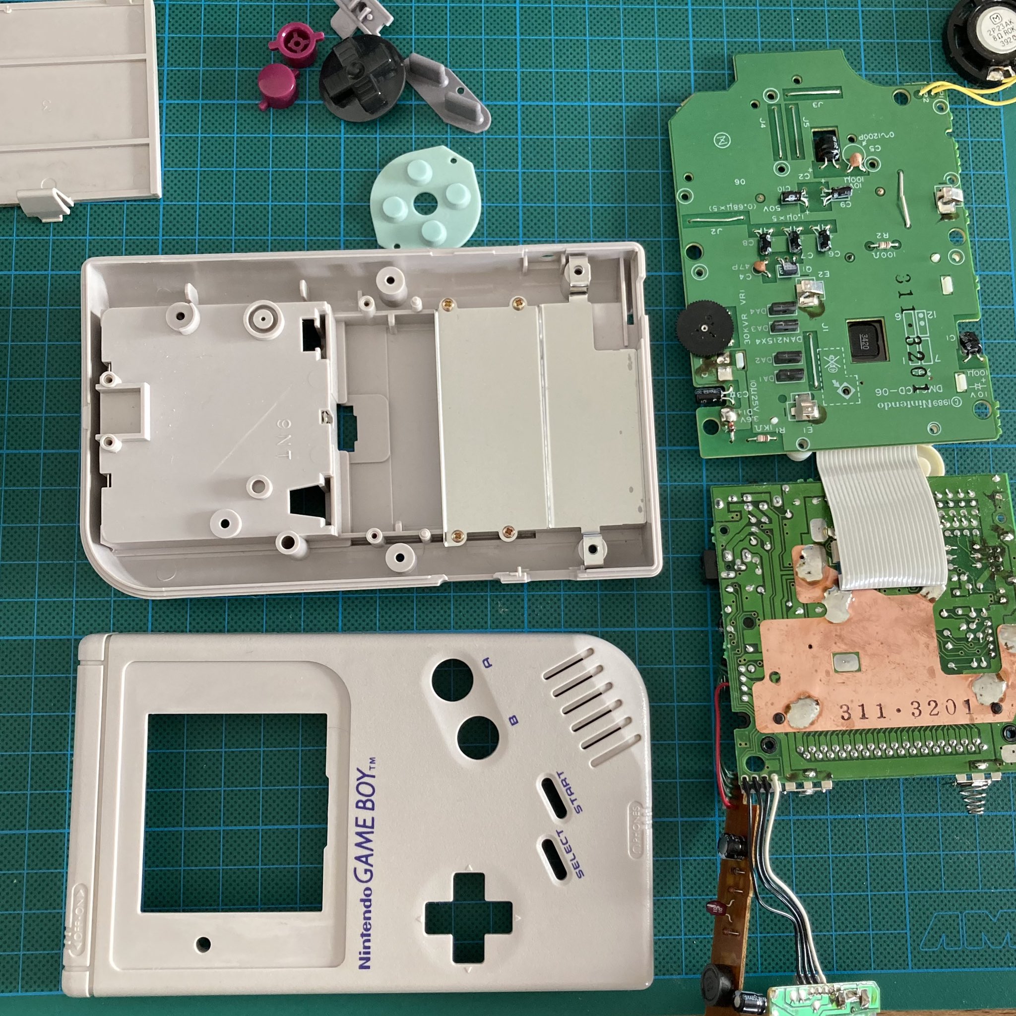 Gameboy parts put apart on the desk